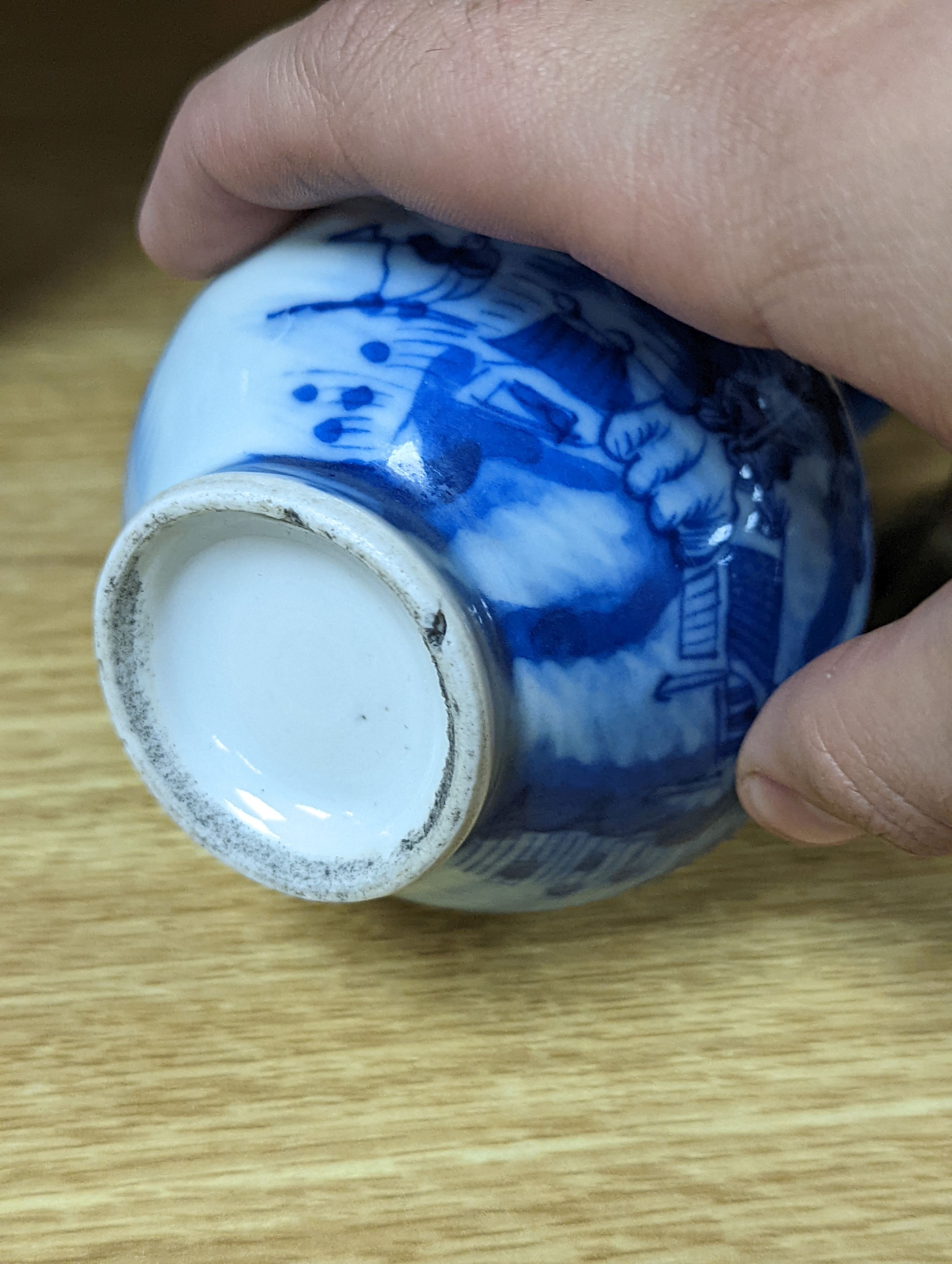 A 19th century Chinese famille rose rice bowl, cover and stand, together with a blue and white dragon jar and similar bottle vase. Largest 18cm